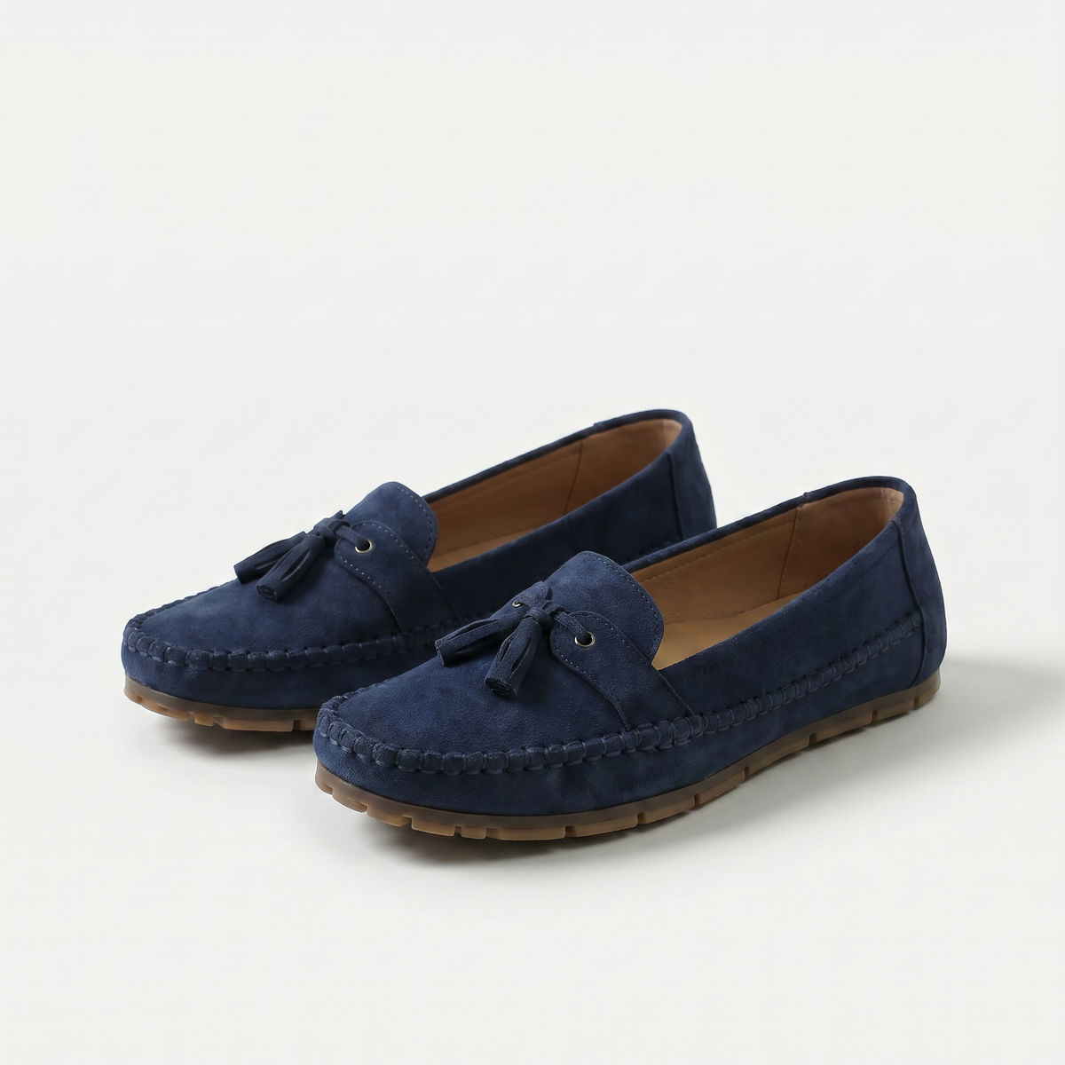 Nadine - Loafers classiques avec détail à pompons