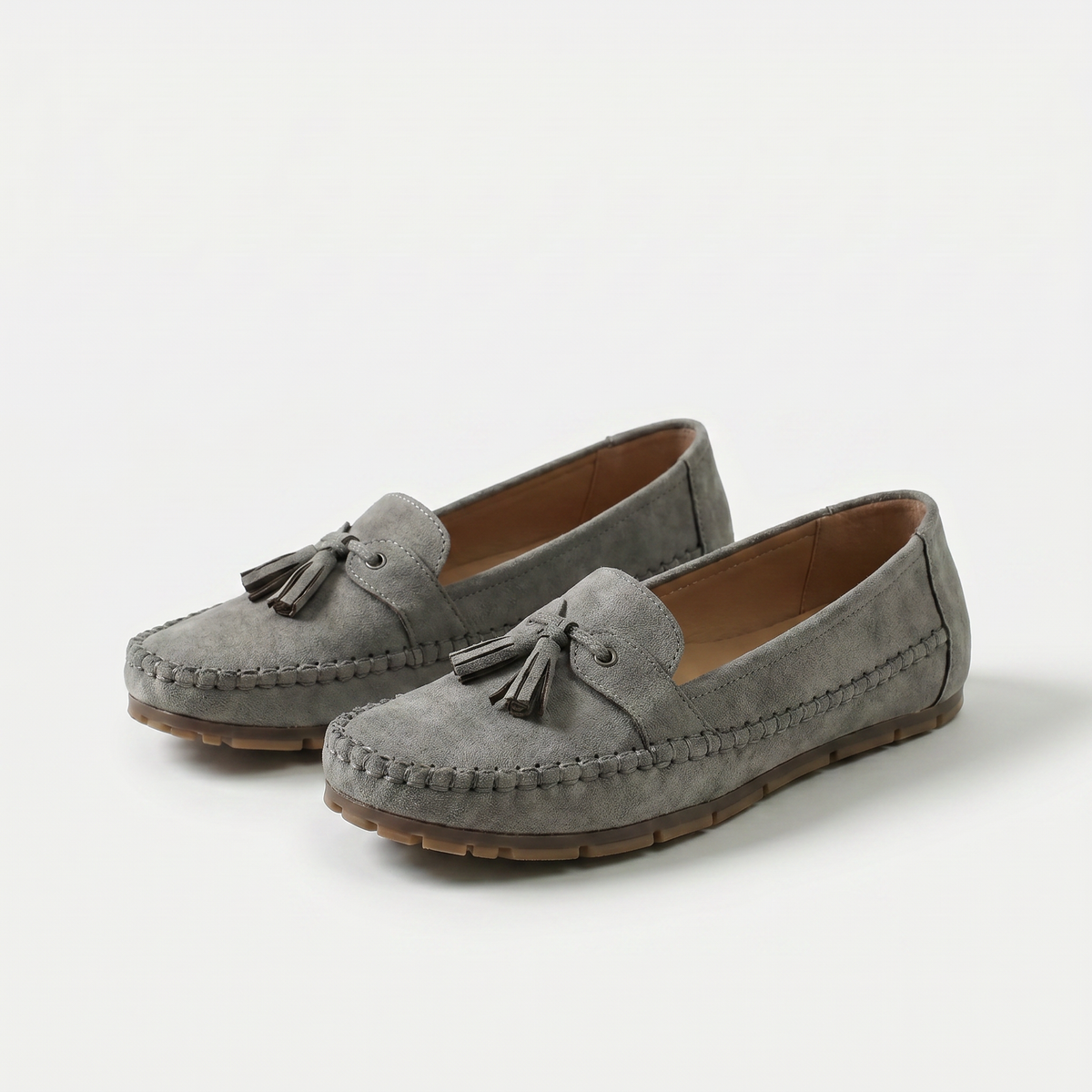 Nadine - Loafers classiques avec détail à pompons